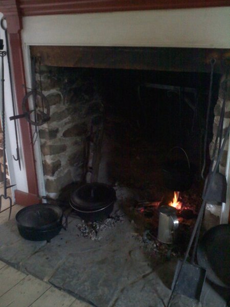Cooking lunch in the fireplace