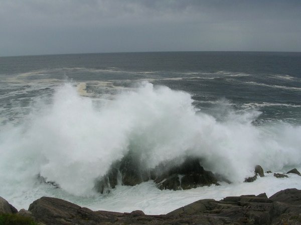 Waves crashing at the Louisbourg lighthouse