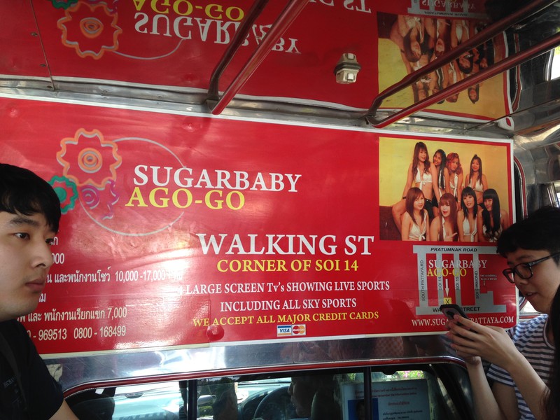 a sign in the open taxi about The Walking Street