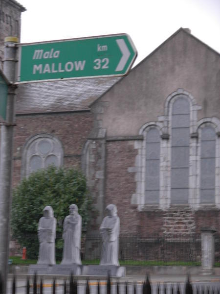 The church across the street with creepy hooded dudes