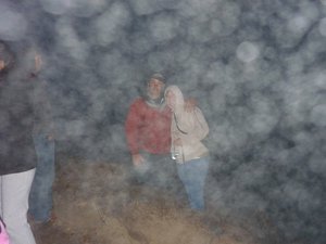 A cloud photobombing James and Rachel