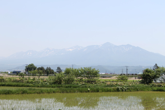 Furano as the mountains of Daizetsuzan NP loom