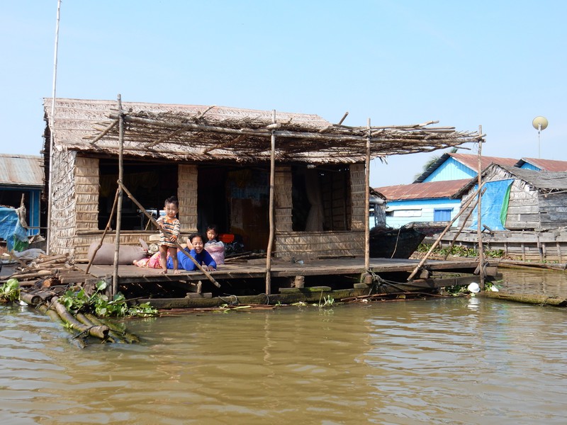 Family from Floating village on our way to Battambang 