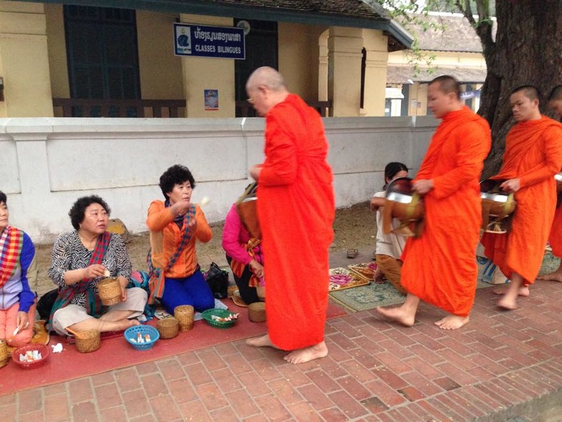 Morning alm in the streets of Luang Prabang