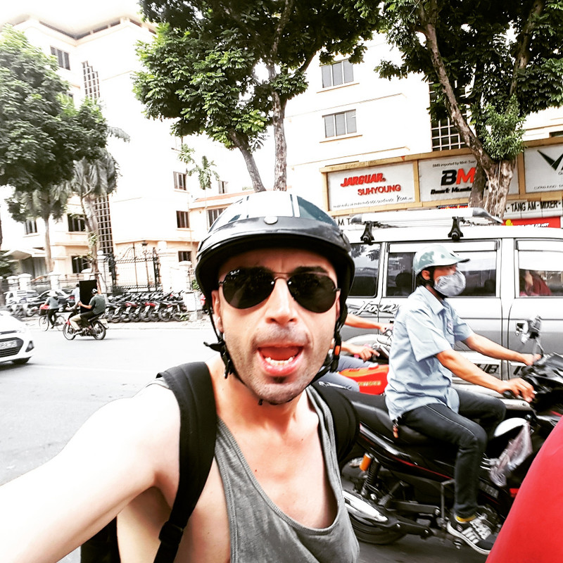 Riding on motorbike in crowded Hanoi