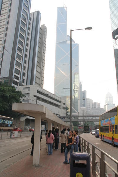Hong Kong Tramway Stop and City Skyline
