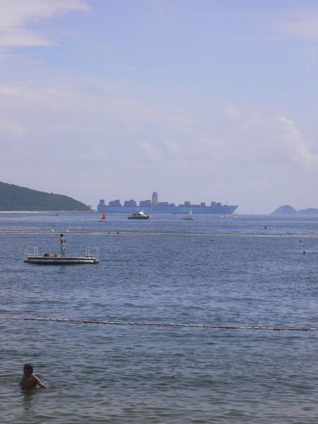 Swimmers and container ships