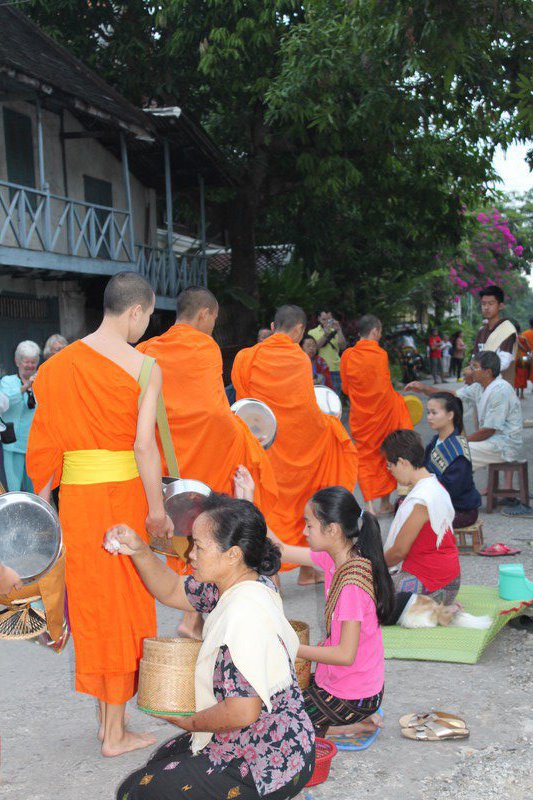 Luang Prabang monks receive alms.