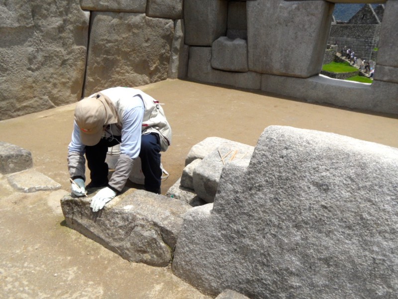 Groundskeeper Cleaning the Rocks