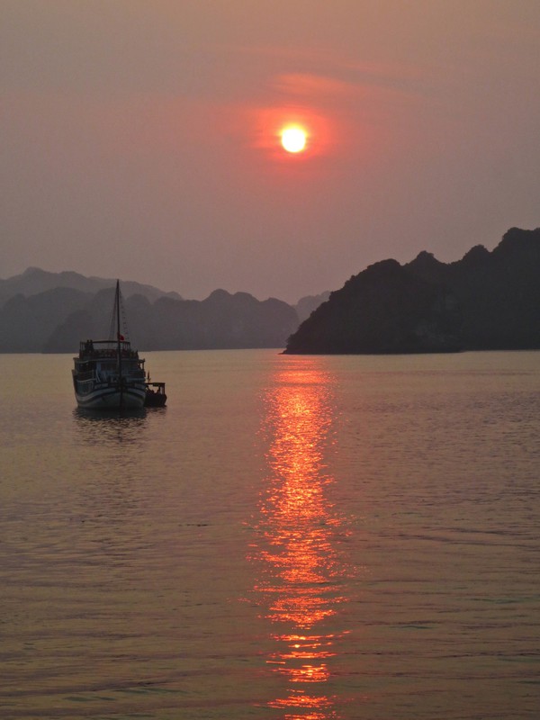 Sun setting on Ha Long Bay, Vietnam