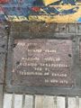 On sidewalk - names of two of the missing 