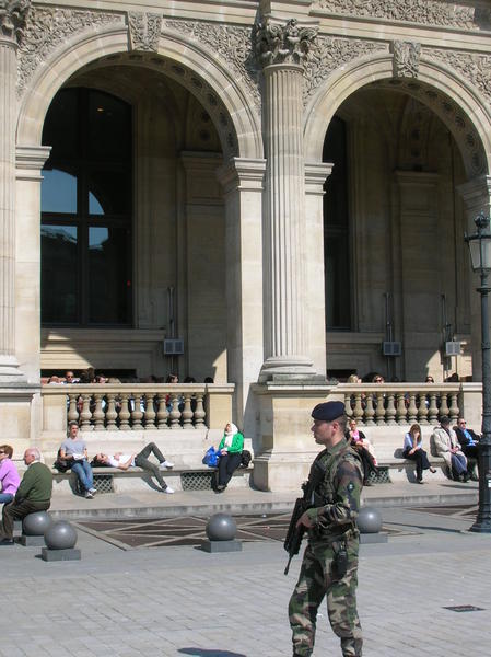 Gaurds at The Louvre with automatic weapons