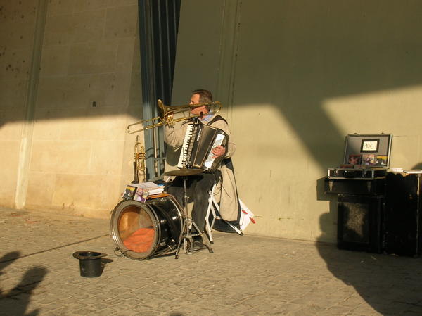 This guy could play the accordian, the trumpet, and the drums at the same time