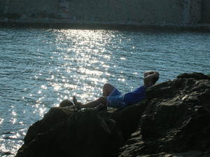 Tyler relaxing on the rocks
