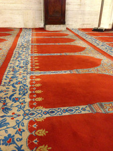 Lines in the carpet to direct worshipers