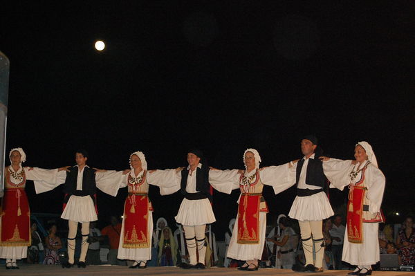 Greek dancing on a moonlit night
