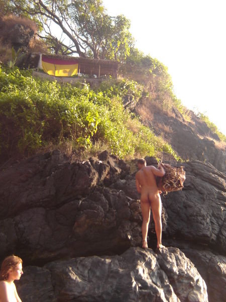 Naked antonio taking fire wood up to his hut ;)