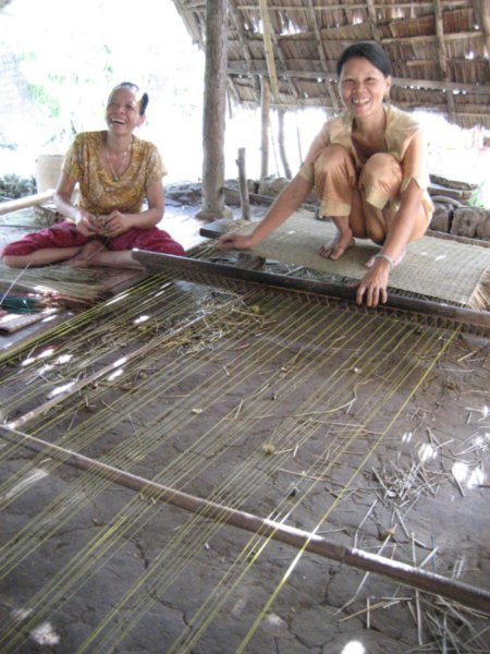 Weaving straw mats near Can Tho