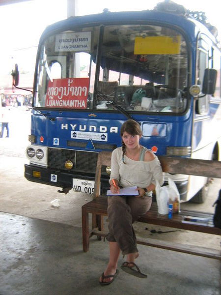 Bex writing her diary in front of the Bus