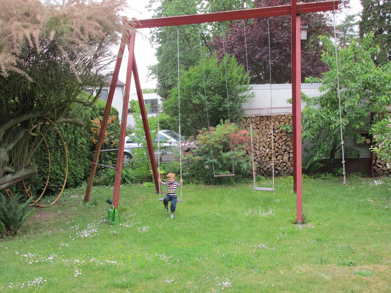 Testing the Hoffmann's swing set which Rainer built himself when the girls were little.