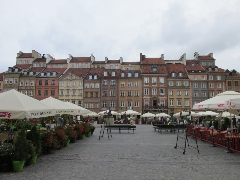The very quiet central market square in Warsaw's Old Town. I love the buildings behind though.