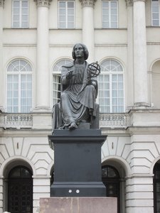 A statue of perhaps Poland's most famous and significant historical figure. You should know who it is but just in case you don't it is Nicolaus Copernicus.