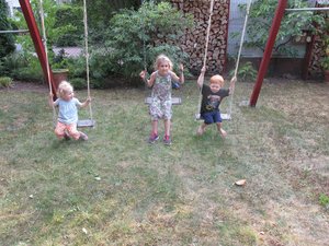 Zachary and his new friends on the swing at the Hoffmanns'