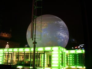 The Globe later that night with the world projected onto it
