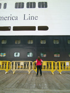 Arica looking up at the big cruise ship docked in Juneau