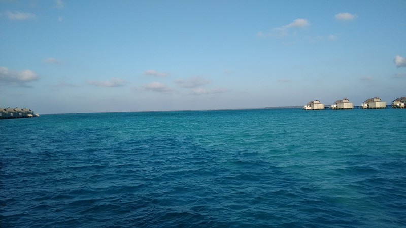 from the left, the sea is blue