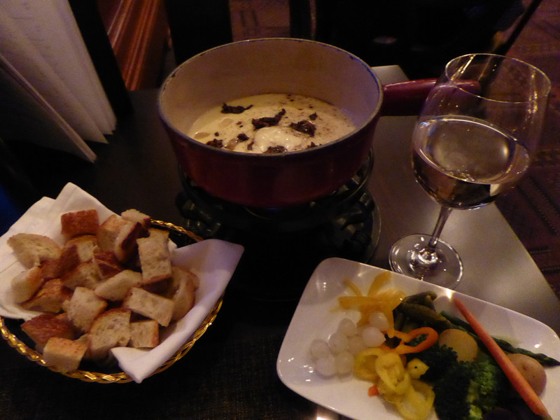My half serve of fondue with a glass of white