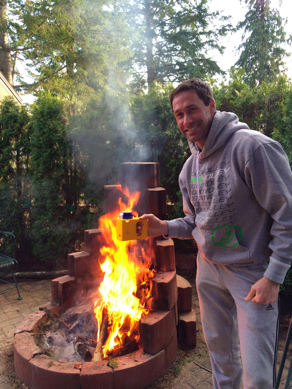 Enjoying a drink by the fire pit