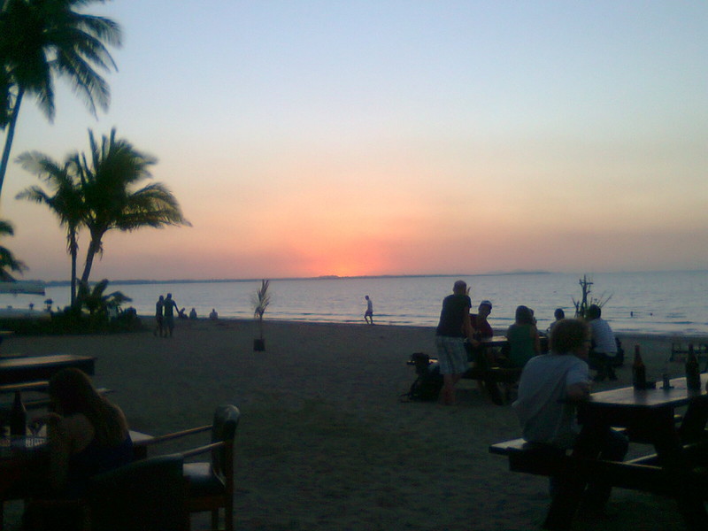 Sunset over the hostel's beach