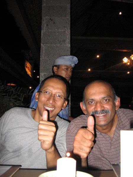 My dad and Tata posing in a restaurant after a long afternoon driving around hotel searching.