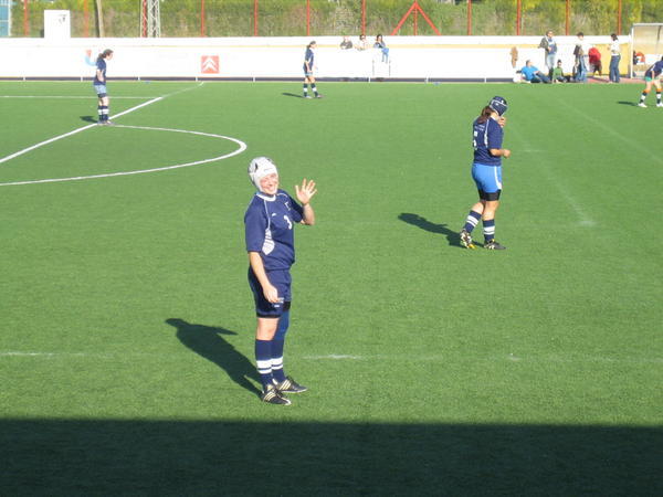 That’s me with my hot new scrum cap, always prepared for a picture.  (The game IS in progress.)