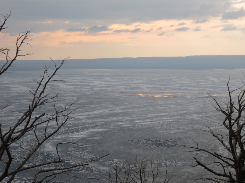 sunset over Yellowstone Lake.  see the ice cracking