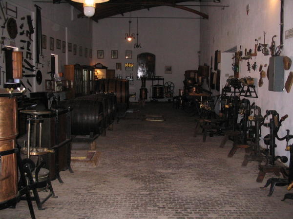 Room full of wine-making artifacts