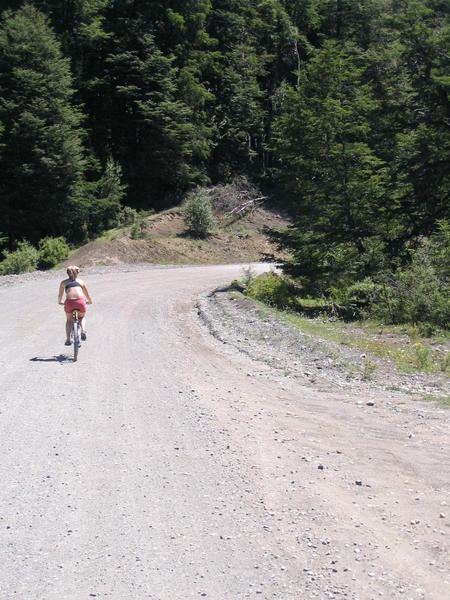 Irene biking up the Cerro dirt road