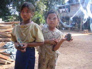 young girls selling their clay elephants, Luang Phabang
