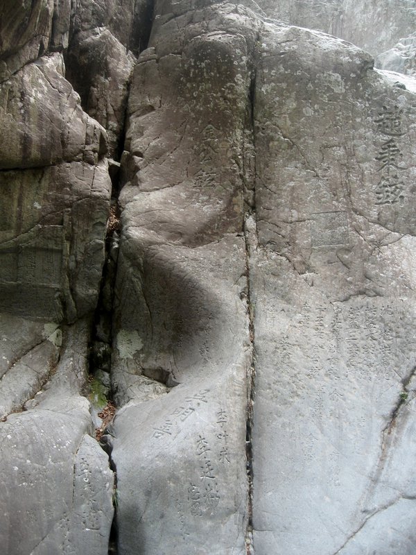 Korean and Chinese Characters Carved Into Rock