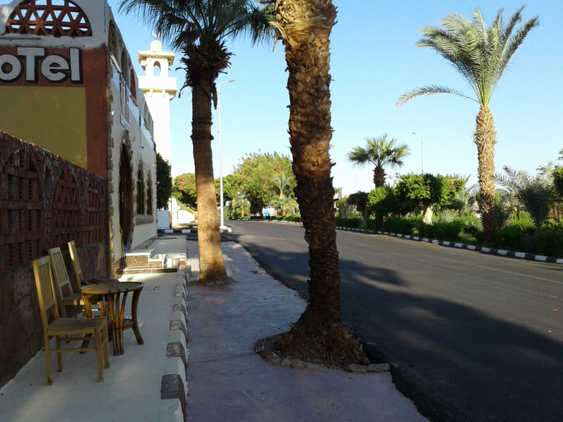 I sat out on the sidewalk, enjoying a street view from Tuya hotel
