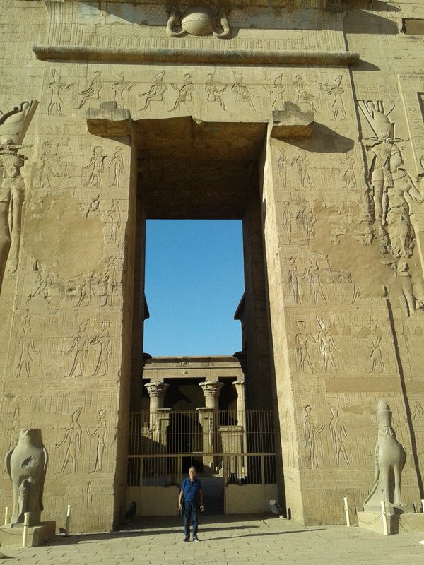 Edfu gate standing between the twin Horus figures 