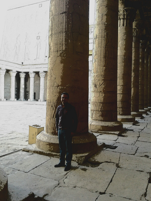 My guide at the foot of the Columns at Temple of Horus in Edfu 