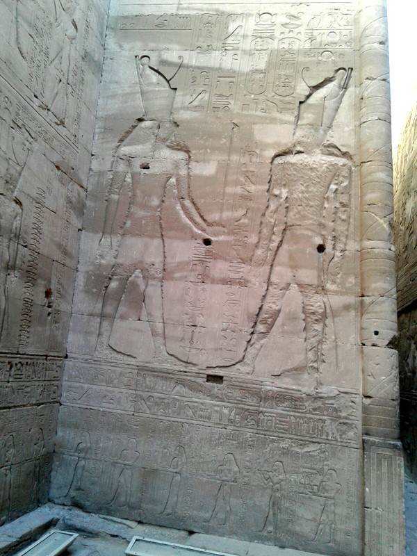 Deliberate defacing of the wall carvings is visible at several of the ancient temple sites