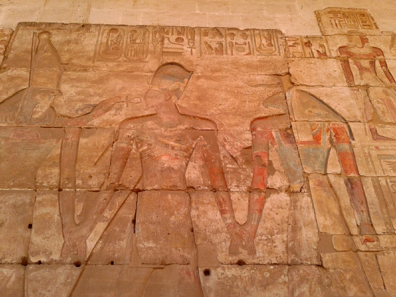 Pharaoh Ramsis flanked by the Gods Horus and Anubis at Ramsis temple in Abydos