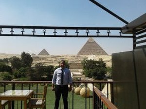 The representative for Deluxe Travel at Great Pyramid Inn 