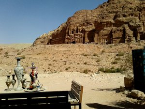 View of the Tombs at Petra while I waited in the shade. Hookahs on the table