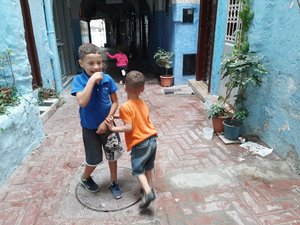 Neighbourhood children playing in front of the riad 