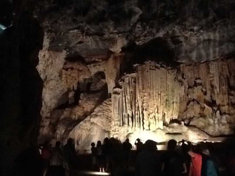 People give an idea of the sheer size of the main cave