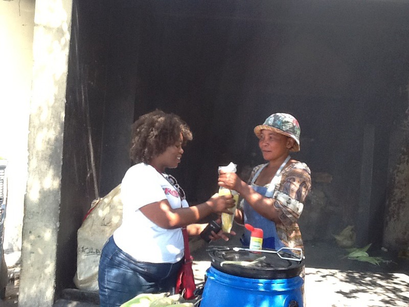 Boil corn! Street side vendor at Washington St in Langa 